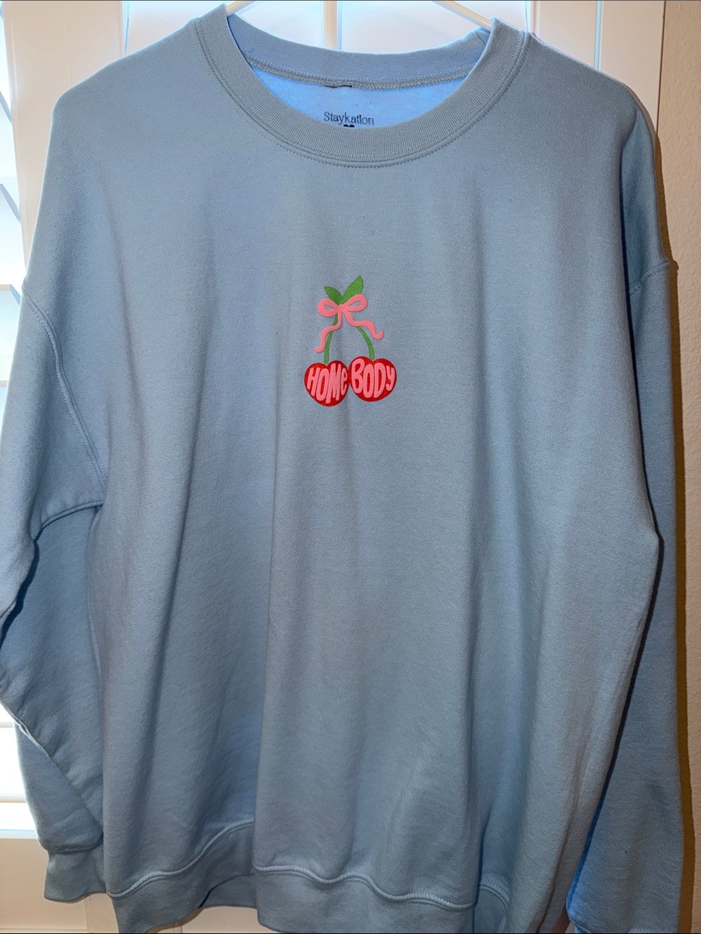 Homebody Cherry Graphic Light Blue Sweatshirt